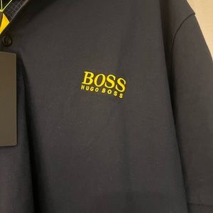 Men’s Hugo boss polo NEW. Runs small.  More like true Xl-XxL